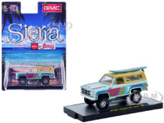 1975 GMC Jimmy Sierra 4x4 Light Blue with Graphics and Tan Top with Surfboard Limited Edition to 10560 pieces Worldwide 1/64 Diecast Model Car by M2 M